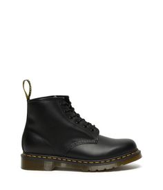 The Dr. Martens® 101 Yellow Stitch boots embodies all the classic clean lines, standout stitching, and edgy attitude of the vintage utilitarian work boot, but in a lower-cut design and a smooth leather construction..Lace-up boots have a smooth leather construction made of a firm, finished leather with a smooth, semi-bright appearance..Six-eyelet boot with sturdy fabric laces for a secure fit..Features classic Doc's DNA including grooved edges, a yellow welt stitch, and a scripted heel loop..Goodyear® welt provides both durability and flexibility..Breathable textile lining..Cushioned insole for long-lasting underfoot support..Air-cushioned rubber outsole is oil, fat, acid, petrol, alkaline resistant and has excellent slip and abrasion resistance..Imported..Product measurements were taken us Classic Chukka Boots For Workwear In Winter, Classic Winter Chukka Boots For Workwear, Classic Winter Workwear Chukka Boots, Classic Ankle-high Waterproof Boots With Reinforced Heel, Classic Ankle-high Work Boots For Fall, Classic Ankle Moto Boots For Work, Classic Ankle Work Boots For Fall, Classic Waterproof Boots For Winter Workwear, Classic Lace-up Martin Boots For Fall