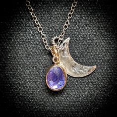 Rose cut glowing tanzanite is set in a handcrafted bezel of 14k gold filled & oxidized 925 sterling silver and is accompanied by a floral crescent moon charm. Suspends from an antique etched cable chain with an artisan hook & loop closure.  ~Wrapped in black gift box ~Handmade in Tennessee Crescent Moon Necklace, Black Gift Boxes, Moon Charm, Herkimer Diamond, Crescent Moon, Moon Necklace, Oxidized Sterling Silver, Rose Cut, Heart Necklace