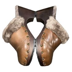 Heel: 2” Comfortable Clogs With Faux Fur Lining, Comfortable Winter Clogs With Faux Fur Lining, Comfortable Clogs With Faux Fur Lining And Round Toe, Casual Clogs With Faux Fur Lining And Round Toe, Winter Slip-on Clogs With Faux Fur Lining, Winter Mules With Faux Fur Lining And Round Toe, Winter Brown Closed Toe Clogs, Leather Clogs With Faux Fur Lining For Winter, Winter Leather Clogs With Faux Fur Lining