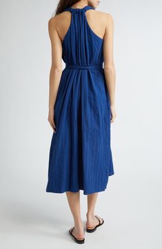 Serve up casual-chic vibes in this sleeveless midi dress framed by a racerback and cinched by a removable robe belt. Slips on over head Deep V-neck Sleeveless Side-seam pockets 100% cotton Dry clean Imported Chic Sleeveless Belted Dress For Daywear, Chic Sleeveless Belted Dress For Spring, Sleeveless Belted Maxi Dress For Daywear, Sleeveless Belted Midi Dress For Casual Occasions, Summer Midi Length Belted Dress With Tie Fastening, Sleeveless Belted Midi Dress For Casual Wear, Sleeveless Tie Fastening Maxi Dress For Daywear, Summer Midi Length Belted Dress For Daywear, Sleeveless Maxi Dress With Tie Fastening For Daywear