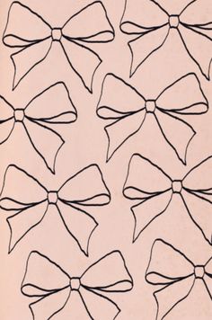 a drawing of several large bows on a light pink background with black lines in the middle