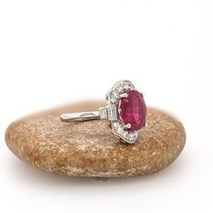 This beautiful ring features a 4.36 carat oval Ruby gemstone with natural earth mined diamonds and milgrain detail, all set in solid 14K gold. This Ruby ring makes a lovely July birthstone gift for your loved ones! This ring is made with solid 14K Gold and natural Earth mined SI / G-H diamonds. Designer Silver Jewellery, Jewelry Appraisal, Jewelry Showcases, July Birthstone, Ruby Gemstone, Custom Jewelry Design, Natural Earth, Beautiful Ring, Ruby Ring