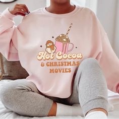 Hot Cocoa And Christmas Movies Crew Neck Sweater Color: Pink Size: Small, Medium, Large, X Large Let Me Know For More Sizes! Custom Made Gildan May Take 3-5 Business Days Material Is 50/50 Cotton/Polyester Machine Cold Wash, Make Sure To Flip Sweater Inside Out Before Washing. Runs A Lil Big As Women's Small But Sweater Is 100% Cotton So Will Shrink In Dryer. This Is A Perfect Gift For Your Friends Or Family Or For Yourself Girly Sweaters, Winter Sweaters Oversized, Hot Cocoa Christmas, Womens White Sweater, Cocoa Christmas, Hot Sweater, Christmas Sweaters For Women, Womens Christmas, Christmas Crewneck