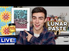 a man is holding up a card with the words lunar paste on it in front of him