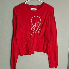 Soul Cycle Women’s Long Sleeve Cropped Red Skull Shirt Size Large New Without Tags - Never Worn Bought For $60 Edgy Red Tops For Fall, Edgy Red Cotton Tops, Red Cotton Edgy Tops, Red Edgy Cotton Tops, Trendy Long Sleeve Tops With Skull Print, Red Long Sleeve T-shirt For Halloween, Casual Red Skull Print Tops, Red Long Sleeve Cotton Crop Top, Cycle Women