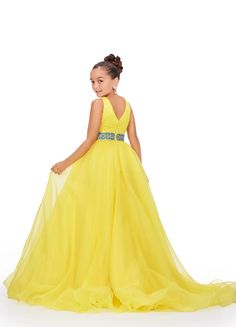 Expertly designed for young pageant contestants, the Ashley Lauren Kids 8249 dress combines a classic A-line silhouette with a modern V-neckline and sparkling crystal belt. Made from luxurious organza fabric, this dress is both elegant and comfortable, ensuring your child will look and feel their best on stage. This v-neckline kids ball gown features a ruched bodice giving way to a crystal beaded waistline. The look is complete with a full organza a-line skirt. V-Neckline Ruched Bustier Beaded B Yellow Girls, Ashley Lauren, Crystal Belt, Girls Pageant Dresses, Ball Gown Skirt, Pageant Gowns, Beaded Belt, Pageant Dress, Organza Fabric