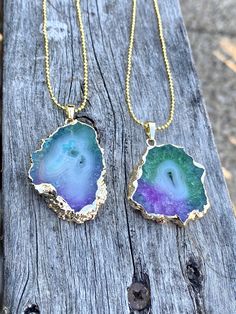 "Mesmerizing, natural rainbow Druzy Geode fully crystallized minerals, with irregular sizes and shapes. There are currently 2 in stock and all different since natural Stones are hard to get to a fixed shape and size. --The sizes: Pendant A: 1.25\" around approximately. Pendant B: 1.50\"*1.25\" approx. --20\" inches long ball chain, 14k yellow gold plated over copper. --The pendants are 14k yellow gold electroplated." Natural Stone Crystal Pendant, Large Stone Mineral Crystal Necklaces For Jewelry Making, Large Stone Mineral Crystal Necklace For Jewelry Making, Iridescent Necklaces With Natural Stones For Healing, Iridescent Gemstone Necklace For Healing, Multicolor Gemstone Mineral Crystals, Raw Stone Geodes In Mineral Crystal As Gift, Spiritual Multicolor Agate Crystal Necklaces, Unique Multicolor Pendant Crystal Necklace