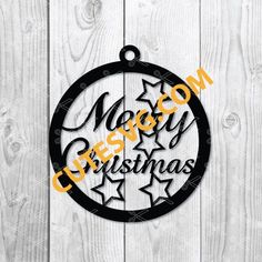 merry christmas ornament hanging on a white wooden wall with the words merry and stars