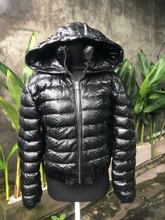 WINTER COLLECTION 2020/2021 Snakeskin DUCK DOWN Jacket for women. A jacket made from genuine python leather. Removable hood. Outside: GENUINE PYTHON LEATHER Inside: DUCK DOWN 100% Accessories: silver color (please see the photo). Lining: MONCLER All our products are 100% handmade, we always try to create interesting ideas to make your style unique. We use only the highest quality materials and accessories from around the world and only best leather from Indonesia. Before listing each new model u Luxury Hooded Puffer Jacket With Zipper Closure, Luxury Hooded Puffer Jacket For Streetwear, Luxury Puffer Jacket With Double-lined Hood, Luxury Quilted Hooded Outerwear, Luxury Quilted Hooded Puffer Jacket, Luxury Fall Puffer Jacket With Double-lined Hood, Luxury Hooded Leather Jacket For Winter, Luxury Black Hooded Leather Jacket, Luxury Hooded Jacket With Padded Collar