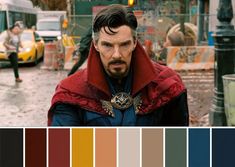 there is a man with a red cape in the middle of a street, and color swatches