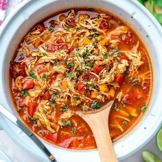 a white bowl filled with chicken tortilla soup