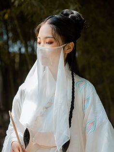 Add a touch of mystery and drama to any hanfu ensemble with these simple veils. Traditionally worn on long journeys, special events, and just for fun! Choose from a variety of colors to best suit your style. Perfect for layering over surgical masks while adding a fantastical touch ~ Material: polyester chiffon Size: 40*60cm About the brand: 绛尾儿 绛尾儿, or Jiang Yi'er is the leading hanfu accessory store for veils and stunning beaded belts. Creating gorgeous accessories for every dynasty, they offer White Hair Color Ideas, Rose Character, Veil Mask, Ancient Chinese Hairstyles, Hanfu Accessories, Beaded Belts, Simple Veil, Drama Masks, White Hair Color