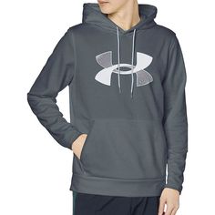 a young man wearing a gray under armour hoodie