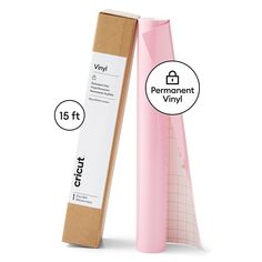 a pink cardboard tube next to a box with the word vinyl on it and an image of