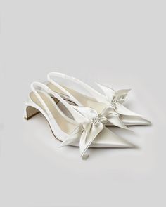 White Flat Heel Slingback Sandals For Party, White Summer Formal Kitten Heels, Spring Wedding White Slingback Sandals, White Flat Heel Slingback Pumps For Evening, Cream Elegant Slingback Sandals, White Open Heel Slingback Sandals For Evening, White Ankle Strap Slingback Sandals For Wedding, White Slingback Kitten Heels For Wedding, White Slingback Wedding Shoes For Summer