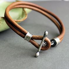 Mens Leather Bracelet Rustic Natural Light Brown Handmade. $74.00, via Etsy. Diy Leather Bracelet, Leather Jewellery, Men's Bracelets, Mens Leather Bracelet, Bracelet Diy, Leather Bracelets, Nature Bracelets, Leather Diy, Mens Leather