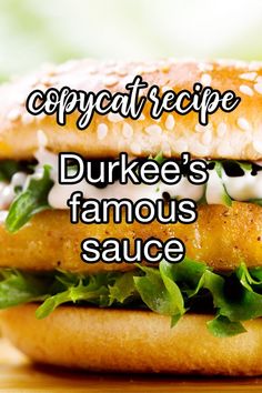 a close up of a sandwich with lettuce and cheese on it that says, copycat recipe duke's famous sauce