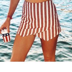 Brand New With Tags! This Is A Red And Beige Stripped Skort They Have A Zipper In The Back To Make It Easier To Get One. You Could Dress This Up Or Down. Perfect For Memorial Day Or The Fourth Of July! Summer Bottoms With Built-in Shorts For Beach Party, Fitted Shorts For Day Out At The Beach, Stretch Beach Party Shorts, Red Summer Shorts For Beach, Red Beach Shorts For Summer, Red Summer Beach Shorts, White Short Bottoms For Beach Party, Fitted Summer Vacation Bottoms, Fitted Bottoms For Summer Vacation