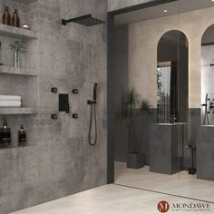 a bathroom with two sinks, shower and shelves on the wall next to each other