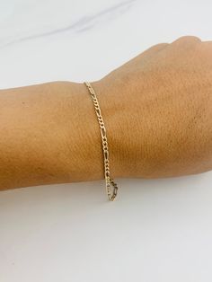 "❤️ 10K Gold bracelet multi-tone figaro ❤️ 7.5\" long ❤️ Women's / Girl bracelet ❤️ 2.3mm wide ❤️ Yellow White Rose Gold - Multi tone Gold ❤️ Multi-tone fígaro link ❤️ New fine jewelry ❤️ Small box included ❤️ Pulsera Brasalete en oro de 10 Kilates ❤️ Oro blanco, dorado y rosado ❤️ 3 tonos de oro ❤️ Pulsera de 7.5 pulgadas de larga para mujer ❤️ 2.3 milímetros de ancha ❤️ Eslabon fígaro Joyería nueva SKU 7142" Adjustable Yellow Gold Bracelet With Figaro Chain, Everyday 14k Gold Bracelet With Figaro Chain, Everyday 14k Gold Figaro Chain Bracelet, 14k Gold Figaro Chain Bracelet Gift, Yellow Gold Bracelet With Figaro Chain, 14k Gold Bracelet With Figaro Chain, 14k Gold Figaro Chain Bracelet, Dainty 14k Gold Bracelet With Figaro Chain, Adjustable Yellow Gold Figaro Chain Bracelet