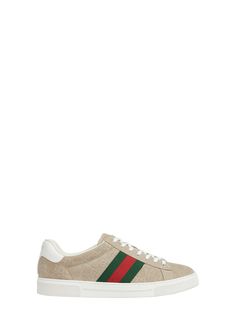 "Find GUCCI Ace Suede Monogram Low-top Sneakers on Editorialist. Gucci \"Ace\" low-top sneakers in GG monogram suede Flat heel; 1.2\"H Round toe Lace-up vamp; branded metal tag Leather backstay with logo lettering Iconic red and green web on the sides Rubber outsole Additional pair of laces included Made in Italy" Sporty Beige Sneakers With Logo, Beige Lace-up Sneakers With Logo, Beige Logo Sneakers For Streetwear, Gucci Low-top Sneakers With Logo, Beige Sneakers With Embroidered Logo For Streetwear, Beige Embroidered Logo Sneakers For Streetwear, Gucci Sporty Custom Sneakers With Logo, Gucci Custom Logo Sporty Sneakers, Sporty Gucci Custom Sneakers With Logo