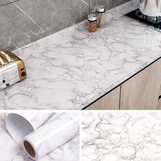 a kitchen counter with white marble on it and gold trim around the edges, along with an image of toaster