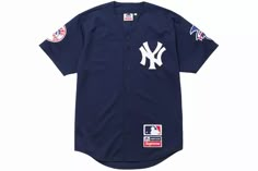 the new york yankees baseball jersey is shown in blue and has white lettering on it