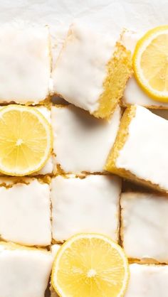 slices of lemon cake with white frosting on top