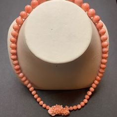 Midway Coral Bead Necklace With Hand-Carved Clasp. Absolutely, Stunning. Formal Coral Single Strand Beaded Necklace, Elegant Single Strand Coral Beads, Elegant Coral Beaded Necklaces With Faceted Beads, Elegant Coral Beaded Necklaces With Large Beads, Elegant Coral Beaded Necklace With Faceted Beads, Elegant Coral Beads, Elegant Coral Necklaces With Large Beads, Coral Beads Necklace, Coral Necklace