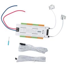 an electronic device with wires and wires attached to the back of it, on a white background