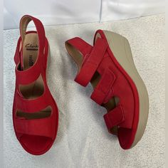 Clark’s Womens Soft Cushion Wedge Leather Suede Adjustable Straps Red Sandals Size 7 New Without Box See Pictures For Details. 2.5 Inch Wedge Red Platform Slip-on Sandals, Red Leather Wedge Sandals, Red Leather Wedge Sandals For Summer, Red Casual Wedge Sandals With Round Toe, Casual Red Closed Toe Wedge Sandals, Casual Red Wedge Sandals, Casual Synthetic Wedge Sandals With Red Sole, Red Ankle Strap Wedge Sandals With Removable Insole, Slip-on Wedge Sandals With Red Sole