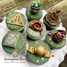 cupcakes decorated with green and gold decorations