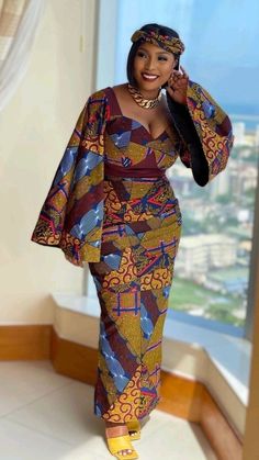 Here's a lovely and Unique dress for you, perfect for specialoccasion like, formal occasions, birthday party and other events.  Made with 100% African Wax cotton.  This piece can be made in other prints, kindly contact Us for fabric options. Measurements needed: -Burst -waist -hip -thigh -height -Shoulder -Sleeve length Care instructions:  Wash with mild soap. Do not bleach. Do not machine wash Long Gown Dress With Ankara, Rich Auntie Outfits, Nigerian Ankara, Styles Ankara, Ankara Dress Designs, Ankara Long Gown, Dress Ankara, Ankara Dress Styles, White Weddings