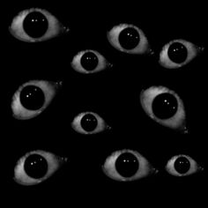 an image of eyes in the dark