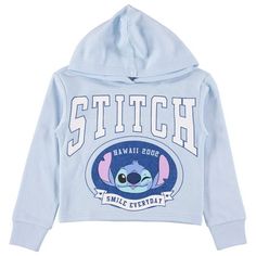 a blue sweatshirt with stitch on the front and an image of stitch at the bottom