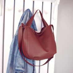 Made of vegan leather in beatiful shade of burgundy red, this large hobo tote for women can be your favorite daily use bag. Multifunctional - you can carry it in your hand, on the shoulder or as hippie crossbody purse. Universal - fits really well with any casual outfit. Large and roomy enough for all your stuff. Perfect for work, school, shopping and walk with children. It's durable, easy to pack and clean. Fastened with zipper. 100% handmade. DETAILS (shown): color: burgundy red pattern: 3in1 Large Capacity Burgundy Satchel, Burgundy Hobo Bag With Large Capacity For Shopping, Fall Hobo Bag With Large Capacity Satchel, Large Capacity Burgundy Hobo Bag For Shopping, Fall Tote Bag With Single Shoulder Strap, Trendy Burgundy Tote Shoulder Bag, Fall Burgundy Bag With Zipper Closure, Fall Burgundy Shoulder Bag With Zipper Closure, Burgundy Shoulder Bag For Fall