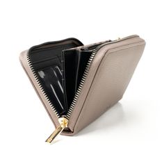 The latest must-have accessory for the modern woman on the go: the Eclipse Convertible Zip-Around Wallet Clutch. Designed with both style and functionality in mind, this versatile piece is the perfect blend of a traditional wallet and a chic clutch, making it a staple in any wardrobe. Crafted from premium materials, the Eclipse Convertible boasts a sleek, durable exterior that's resistant to wear and tear, ensuring your wallet remains as stunning as the day you bought it. The zip-around closure Versatile Coin Purse With Card Slots For On-the-go, Versatile Travel Coin Purse With Card Slots, Versatile Everyday Coin Purse With Interior Card Slots, Versatile Everyday Coin Purse With Card Slots, Versatile Everyday Coin Purse, Versatile Wallets With Rfid Blocking For On-the-go, Versatile Coin Purse With Card Slots, Versatile Rfid Blocking Wallets For Everyday Use, Versatile Everyday Wallet With Rfid Blocking