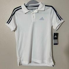 Nwt Boys Adidas Polo. Size Small. Perfect For Back To School! White And Black Polo That Is Nwt!! Adidas White Fitted T-shirt, Adidas Fitted White T-shirt, White Fitted Adidas T-shirt, Basic White Adidas Tops, White Basic Adidas Tops, Red Polo Shirt, Black Polo, Adidas Shirt, Adidas Sport