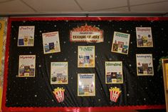 the bulletin board is decorated with movie posters and popcorn buckets on it's sides