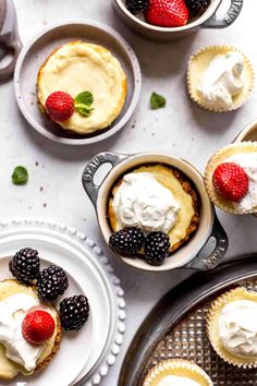 small desserts with fresh berries and whipped cream on the top are ready to be eaten