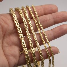 Square Byzantine Link Chain Bracelet 14K Yellow Gold All Sizes * Metal : Real 14K Gold (Properly Stamped, 14K) * Condition : Brand New * Finish : Polished * Average Weight :  8" - 2.0mm : 2.52 grams (0.31 g/in) 8" - 2.5mm : 3.58 grams (0.44 g/in) 8" - 3.0mm : 6.14 grams (0.76 g/in) 8" - 4.0mm : 8.73 grams (1.09 g/in) 8" - 5.0mm : 12.79 grams (1.59 g/in) * Length : Selectable * Width : Selectable * Clasp/Bail : Lobster Lock All of our items are brand new and are shipped with a gift box. Gold Byzantine Box Chain Jewelry, Gold Byzantine Jewelry With Box Chain, Gold Byzantine Style Jewelry With Box Chain, Gold Byzantine Link Jewelry, Yellow Gold Byzantine Jewelry With Box Chain, Byzantine Yellow Gold Jewelry With Box Chain, Gold Byzantine Chain Jewelry, Average Weight, Link Bracelets