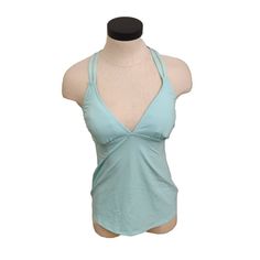 Brand New With Tags Women's Tankini Swimsuit Top In Light Blue With A Strappy Crossback Design Blue Racerback Tankini For Poolside, Sporty Light Blue Swimwear For Active Use, Sporty Light Blue Swimwear For Swimming, Sporty Light Blue Swimwear For Sports, Blue Tankini With Built-in Bra For Yoga, Blue Sleeveless Sports Swimwear, Sleeveless Blue Sports Swimwear, Blue Beach Activewear With Built-in Bra, Blue Athleisure Tops For Poolside