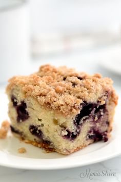 blueberry coffee cake on a white plate with the words gluen free and dairy free