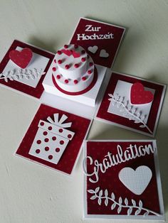 four cards with red and white designs on them, one has a birthday cake in the middle