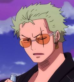 an anime character with green hair and glasses holding a cell phone in his right hand