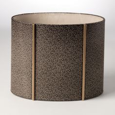 Faux Shagreen Leather Wastebasket with perfectly placed vertical gold-painted wood trim. Dimensions Overall 13"L x 9"W x 10.75"H (3.5 lbs)  MDF Dust with dry cloth Contemporary Baskets, Bronze Decor, Wood Waste, Faux Shagreen, Global Views, Trash And Recycling Bin, Home Office Accessories, Recycle Trash, Wood Trim