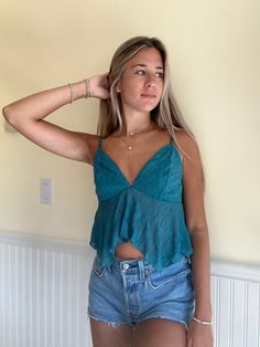 Blue Festival Top Blue Flirty Fitted Tops, Blue Fitted Flirty Top, Flirty Green Summer Tops, Blue Crop Top For Summer Party, Flirty Green Top For Party, Blue Sleeveless Flirty Tops, Flirty Sleeveless Blue Top, Summer Blue Cropped Crop Top, Blue Crop Top Tank For Night Out