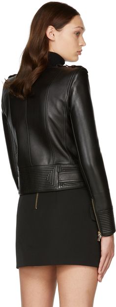 Long sleeve grained lambskin jacket in black. Notched lapel collar featuring press-stud fastening. Offset zip closure at front. Zippered pockets at waist. Buttoned epaulets. Padded shoulders. Zip closure at cuffs. Belt loops at hem. Adjustable belt with pin-buckle fastening at hem. Fully lined. Logo engraved gold-tone hardware. Supplier color: Black Balmain Clothing, Lambskin Jacket, Black B, Adjustable Belt, Press Studs, Lapel Collar, Biker Jacket, Luxury Streetwear, Designer Fashion