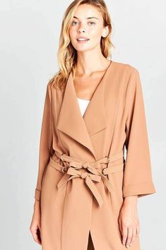 The Easton fallaway collar double D-ring waist long sleeve rolled up cuff coat. This versatile duster coat is perfect all year around. It features fallaway collar, double D-ring waist detail, and rolled up cuff. Fits TTS. 100%Polyester Double Belt, D Ring, Duster Coat, Camel, Cuff, Collar, Long Sleeve, For Sale