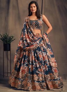 Be the belle of any wedding with our Premium Dove Blue Digital Printed Embroidered Organza Bridal Lehenga Choli. The intricate embroidery and luxurious organza fabric make this readymade Indian party chaniya choli a must-have for any wedding guest. Elevate your style and make a statement with this exclusive piece. The unstitched blouse can be customized upto 46 inches. Do Note: All the accessories shown are for styling purpose only. Slight color variation may occur due to photographic reasons. O Ghaghra Choli, Lehenga Choli For Women, Choli For Women, Floral Lehenga, Organza Lehenga, Lengha Choli, Organza Blouse, Blue Lehenga, Organza Wedding